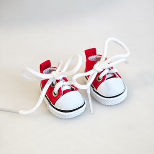 A pair of red canvas shoes