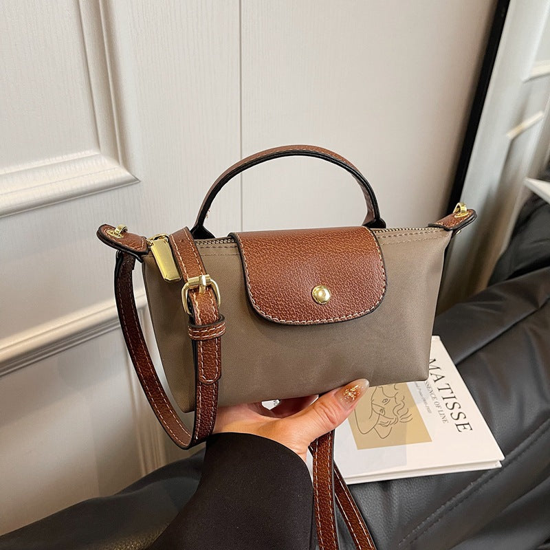 2025 Women's Mini Dumpling Handbag. Made of high - end nylon. Stylish shoulder/crossbody phone bag.