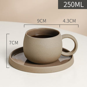 Set of gray cups and saucers