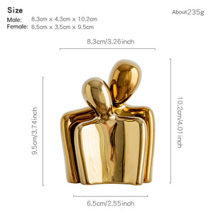 Hugging couple-gold