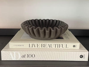 Black pleated decorative bowl