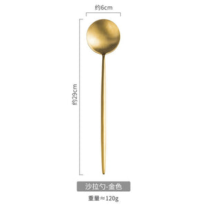 Golden salad spoon