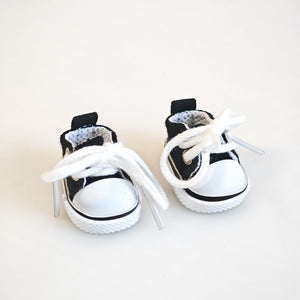 A pair of black canvas shoes