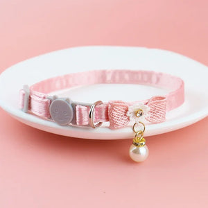 Hanging bead bow tie